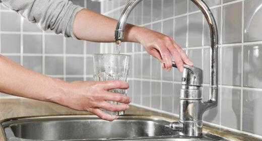 Filling a glass of water